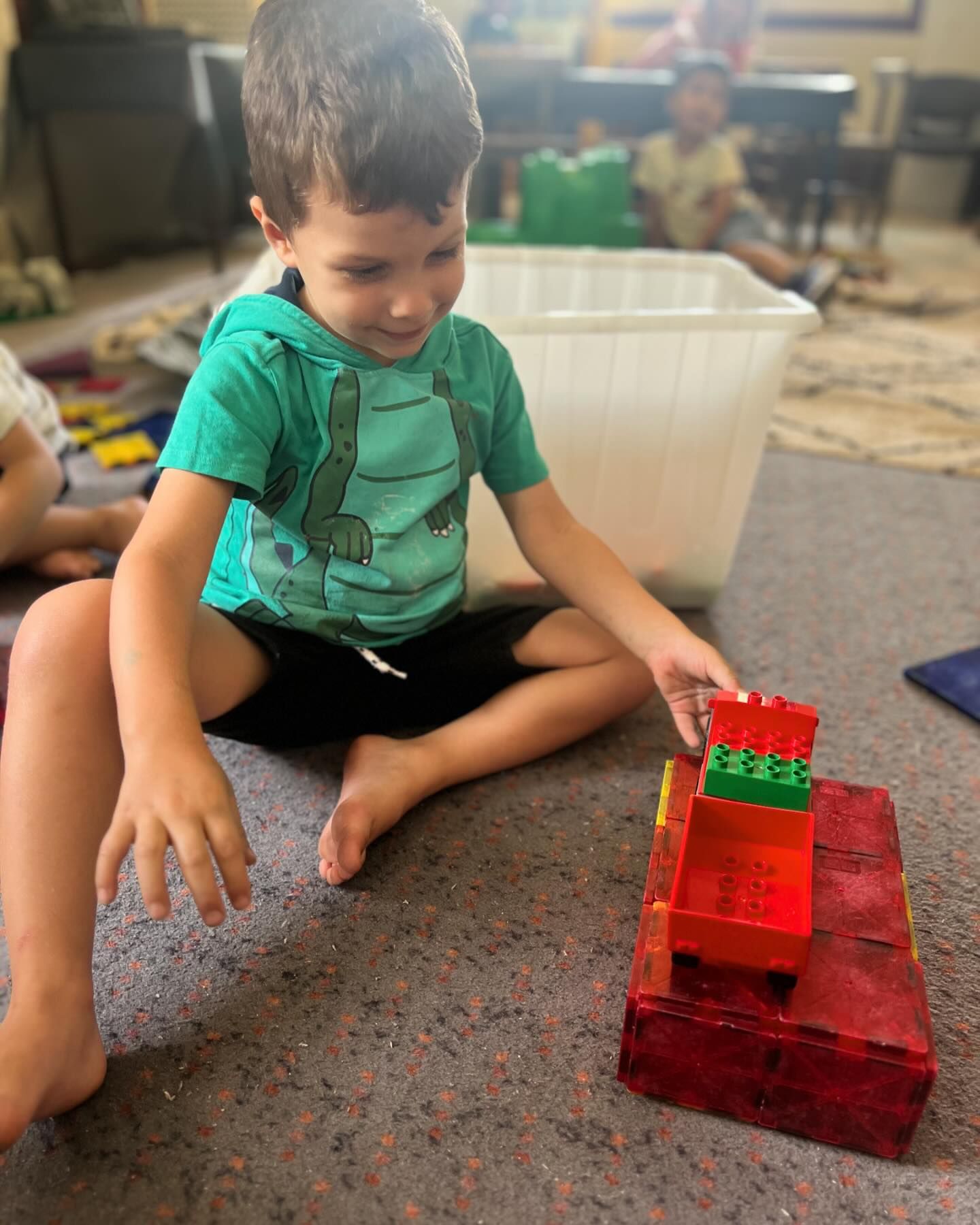 Child building with blocks at preschool