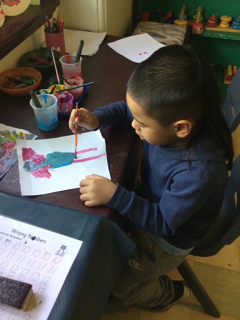 Child painting at Dulwich Hill Preschool