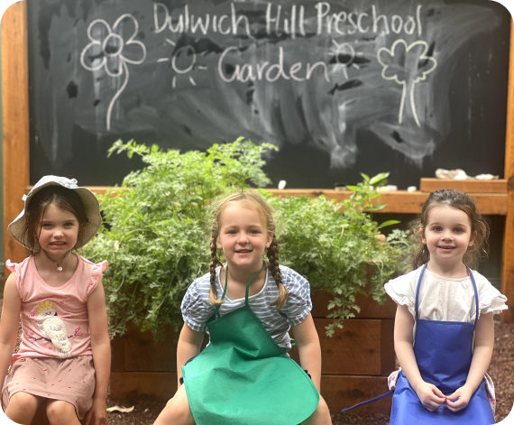 Children sitting in the Dulwich Hill Preschool garden