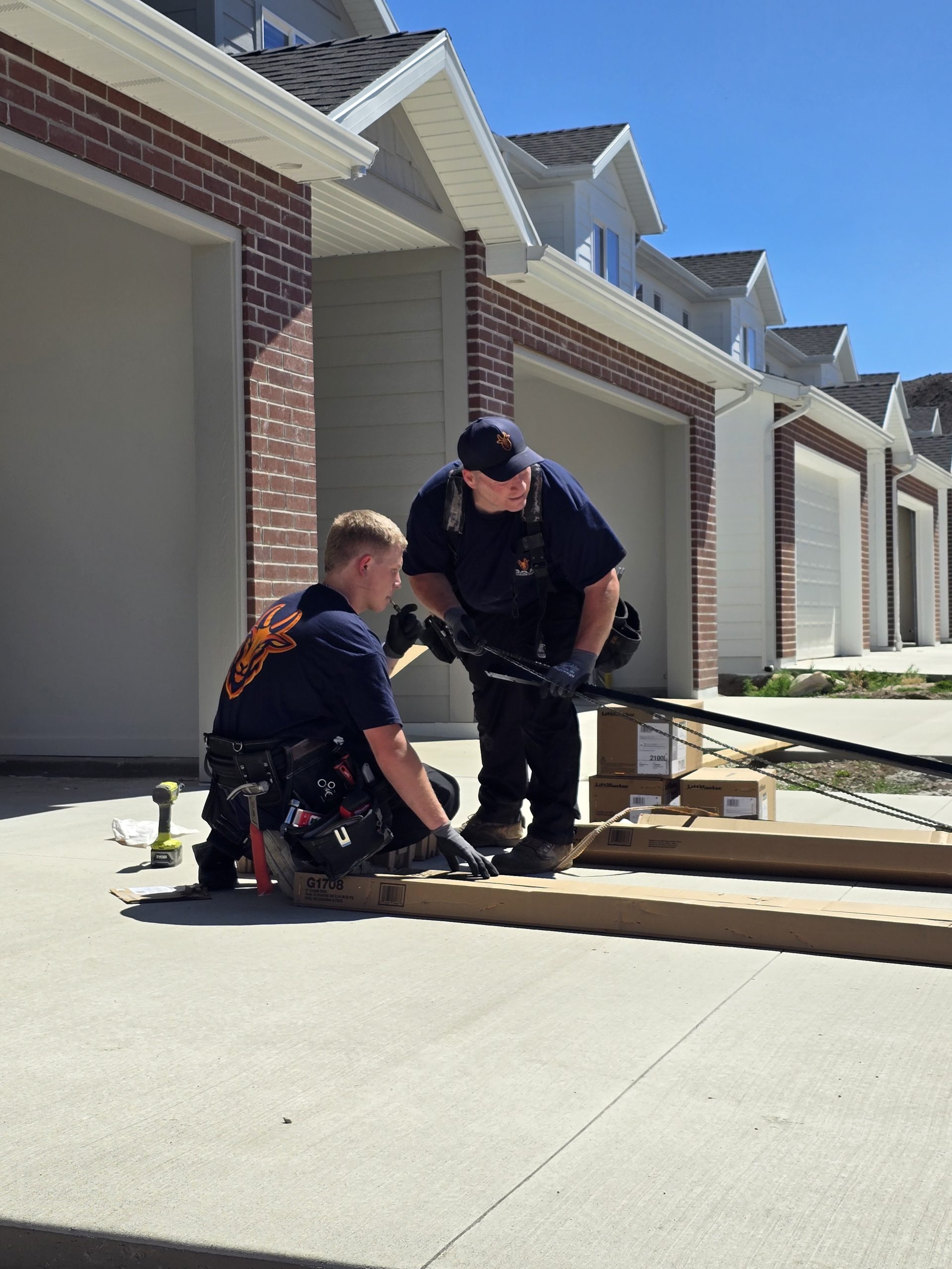 Builders working with GOAT Garage Doors