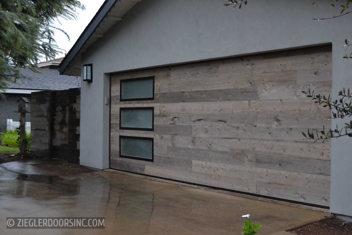 Custom wooden garage door on a home