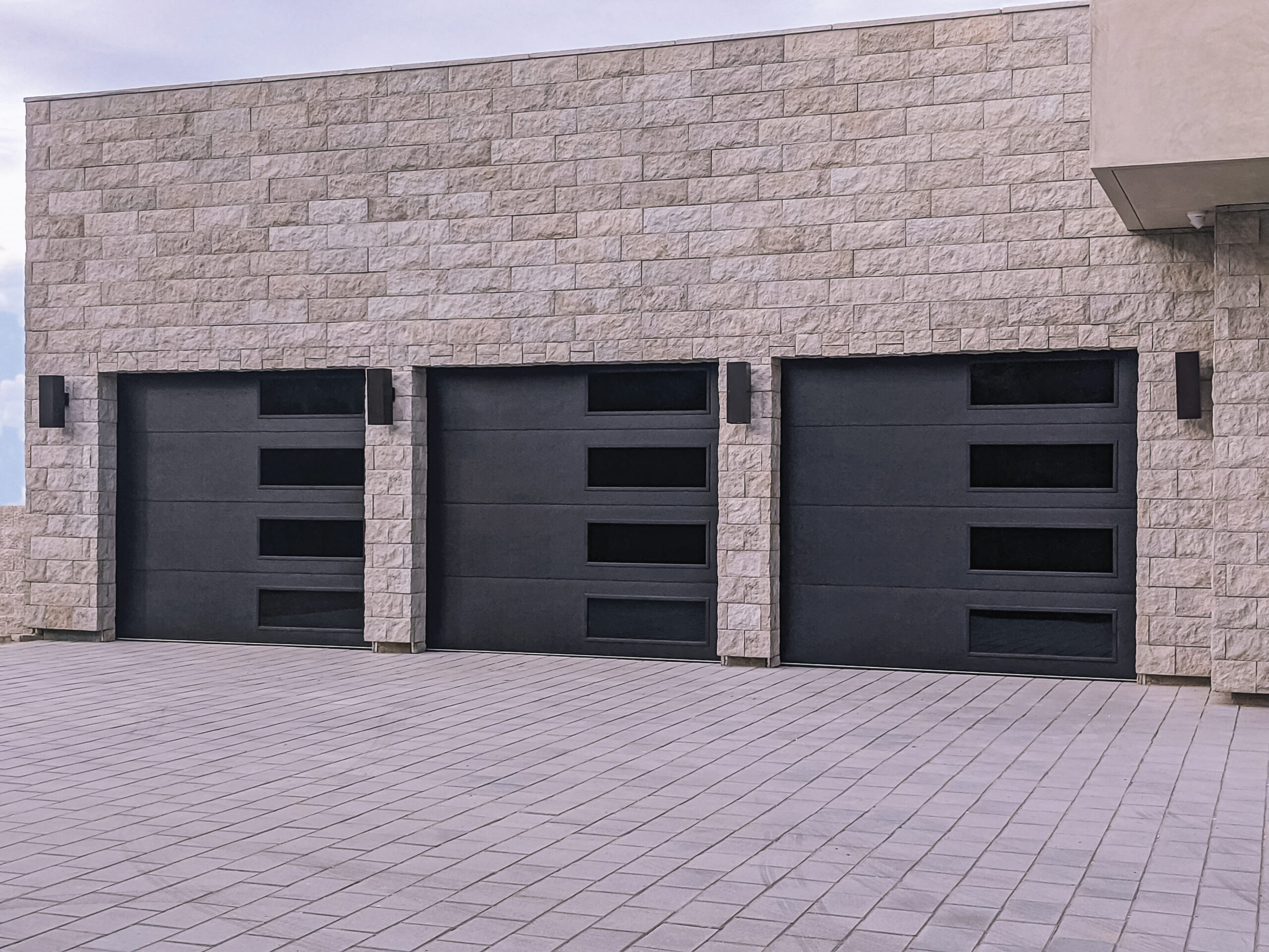 Custom modern garage door with contemporary panel design