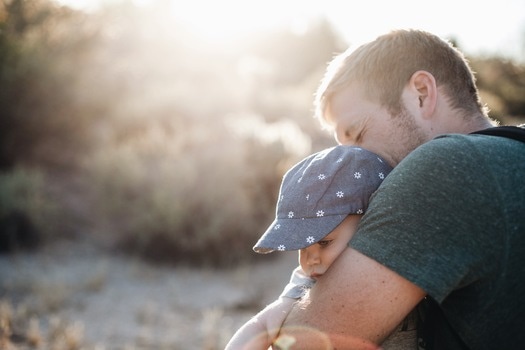 man-baby-hugging